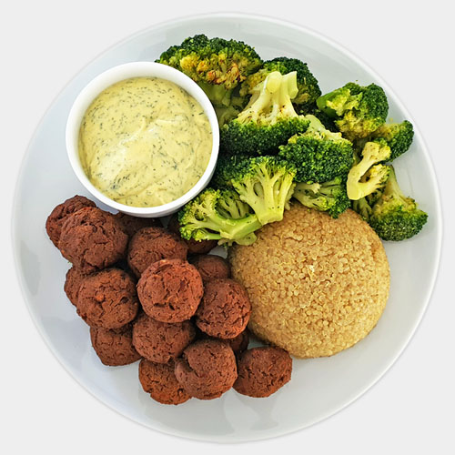 fitpic.ir Lentil Bites Quinoa Broccoli لقمه عدس همراه با کینوا و بروکلی <p>۱. کینوا را شسته و به خوبی آبکشی کنید سپس به یک قابله منتقل کرده و دو برابر حجم کینوا، آب ریخته و آن را به جوش آورده سپس شعله را کم کنید. در قابلمه را گذاشته و تا زمانی که کینوا کاملا پخته شود و آب آن بخار شود، حرارت دهید. (۱۵ دقیقه)</p>
<p>۲. فر را روی دمای ۴۰۰ درجه فارنهایت (۲۰۰ درجه سانتی گراد) تنظیم کنید. عدس پخته را با آب، پودر پروتئین نخود فرنگی، تخم کتان آسیاب شده و خمیر میسو را در یک کاسه بزرگ ترکیب کنید. با ادویه های مورد علاقه ی خود مزه دار کنید و تا زمانی که خمیری شود مخلوط کنید.</p>
<p>۳. خمیر را به اندازه ی لقمه های توپی که در شکل نمایش داده شده، درآورید و به همراه کاغذ روغنی بر روی سینی فر قرار دهید. به مدت ۲۵ دقیقه در فر قرار </p><p>دهید.</p>
<p>۴. بروکلی را به همراه کاغذ روغنی بر روی سینی فر قرار داده و پس از مزه دار کردن با ادویه، آن را در فر قرار داده و به مدت ۱۵ دقیقه بپزید تا کاملا مغز پخت شود.</p><p></p>
<p>۵. یک فنجان را با نصف کینواها پر کرده و بر روی یک بشقاب برگردانید، این کار را با بشقاب دیگر نیز انجام دهید. سپس لقمه های عدس و بروکلی های پخته را به کنار کینوا اضافه کنید و به همراه سس مورد علاقه خود سرو نمایید.</p>
<p><br></p><p><img src="/media/django-summernote/2024-02-13/38c74c61-b494-41c5-bd67-2a4bf18f7e0d.jpg" style="width: 25%;"><img src="https://fitpic.ir/media/django-summernote/2024-02-13/41f29aa9-399e-44f3-a01d-b3c451f7a2f2.jpg" style="font-size: 1rem; width: 25%;"><img src="/media/django-summernote/2024-02-13/d19c8de3-eaec-4860-ac09-eea0d4351303.jpg" style="font-size: 1rem; width: 25%;"><img src="/media/django-summernote/2024-02-13/55b07a78-50e2-4535-8ce7-0e2ce9ad4941.jpg" style="font-size: 1rem; width: 25%;"><img src="/media/django-summernote/2024-02-13/9c24680b-9e15-40f3-ac40-7d6ed5a09ec6.jpg" style="font-size: 1rem; width: 25%;"></p> <p>کینوا: ۱ فنجان (۲۰۰ گرم)</p>
<p>عدس پخته: ۱ قوطی کنسرو (۲۴۰ گرم)</p>
<p>پودر پروتئین نخود فرنگی: ۲ اسکوپ (۶۰ گرم)</p>
<p>آب: نصف فنجان (۱۰۰ میلی لیتر)</p>
<p>تخم کتان آسیاب شده: ۲ قاشق غذاخوری (۳۰ گرم)</p>
<p>بروکلی منجمد: ۳۰۰ گرم</p>
<p>برای بهتر شدن ترکیب، مقداری خمیر میسو به عدس بیفزایید و در نهایت یک سس به انتخاب خود اضافه کنید</p> فیت پیک